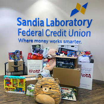 Image of toy donation pile inside of the Juan Tabo branch